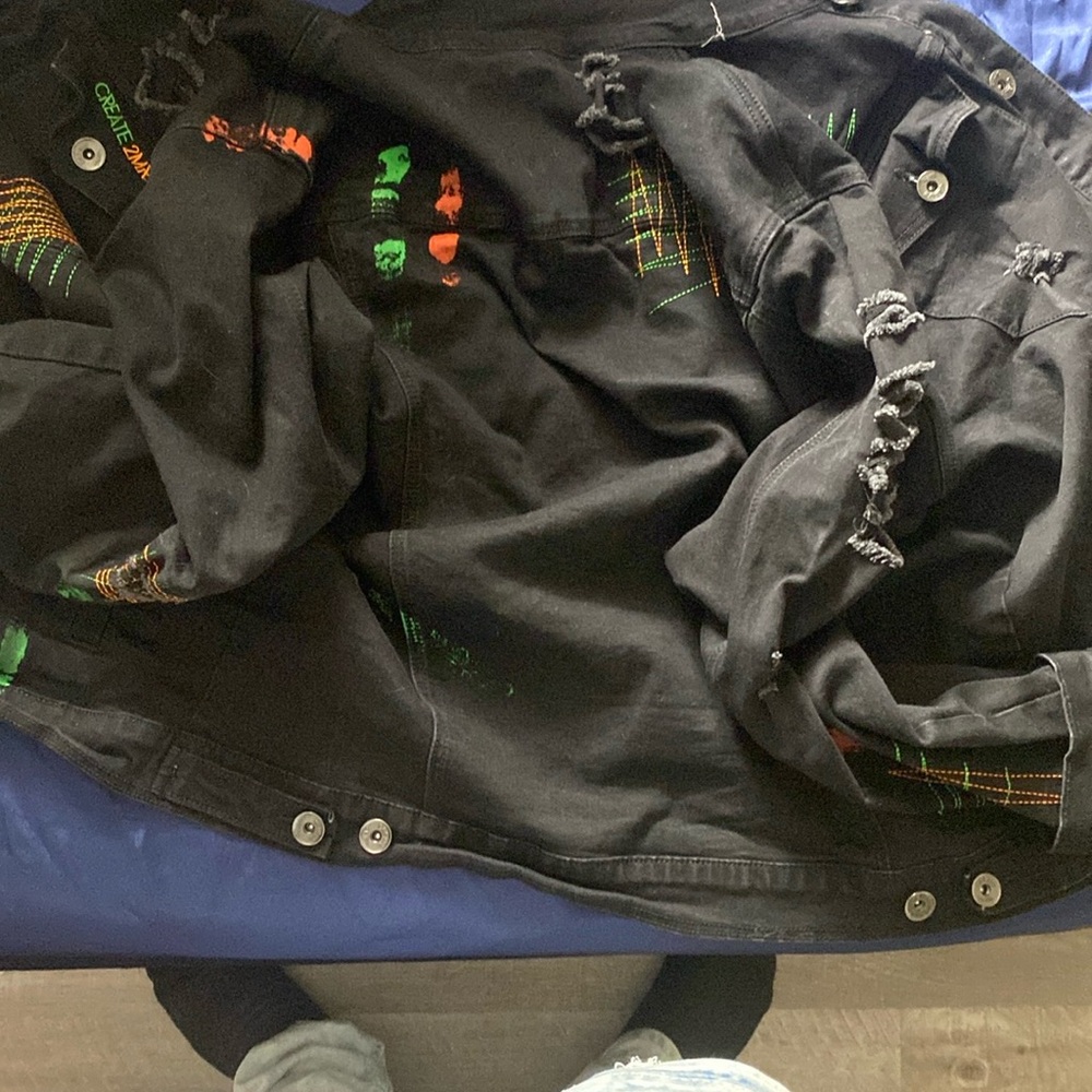 Black Bomber Jacket with Colorful Accents